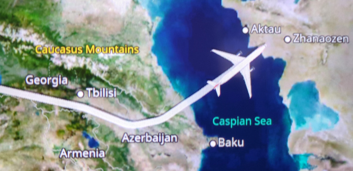 A picture of the screen showing the area near the Caucasus mountains with the plane overflying the Caspian sea